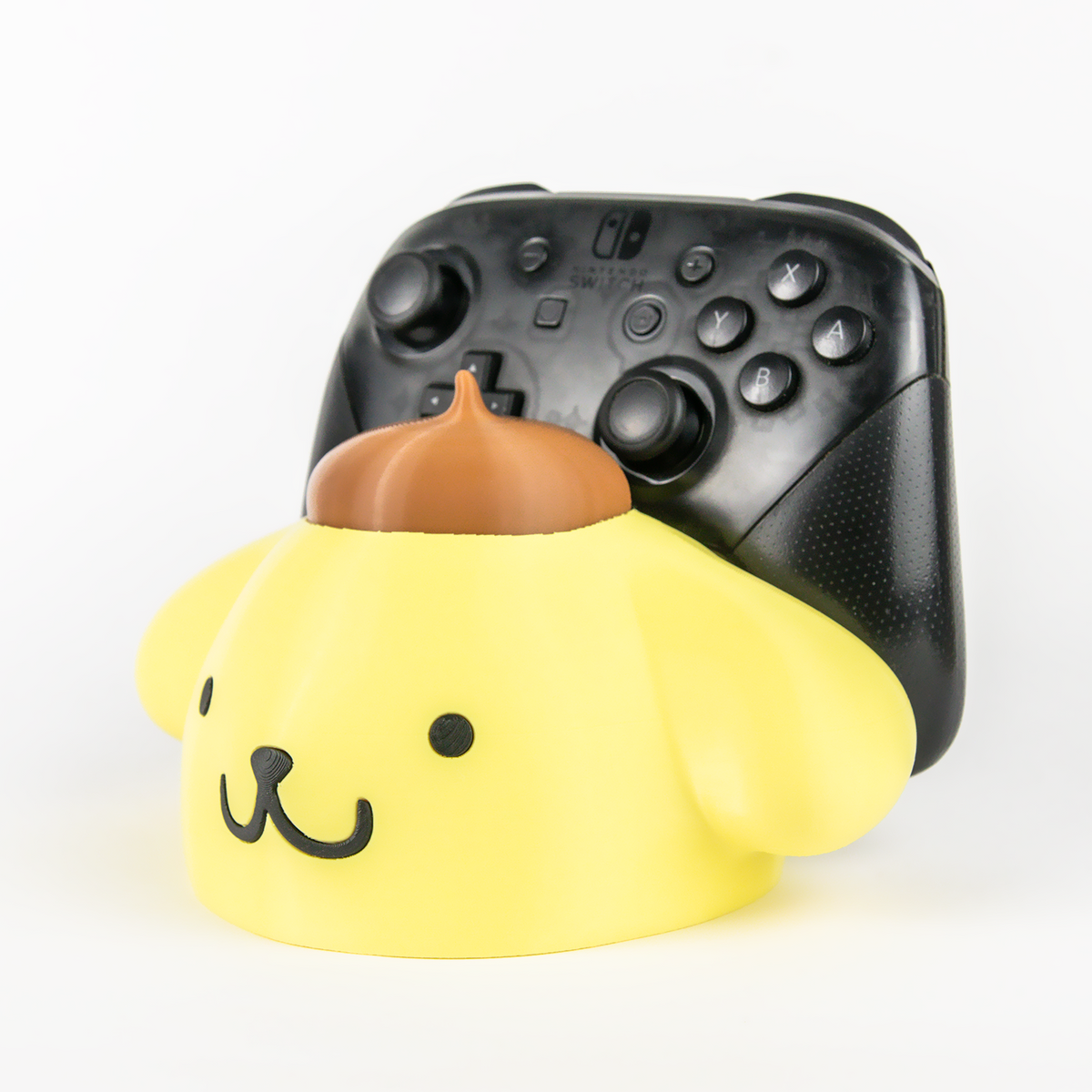 Soporte para mando de Pompompurin - Universal PS/Xbox/Switch