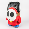 Soporte para mando de Shy Guy- Universal PS/Xbox/Switch